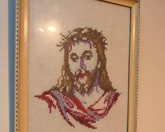 Framed cross-stitch religious portrait of Jesus