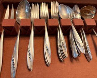 Sterling silver flatware set with floral pattern