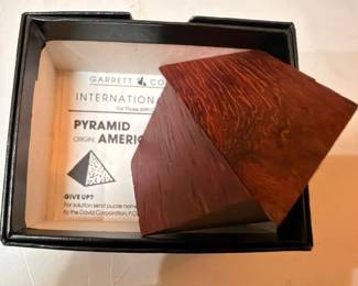 Garrett & Co International Pyramid wooden puzzle in box