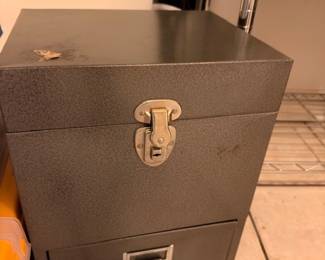 Vintage metal lock box with brass latch
