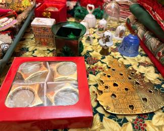 Brass holiday trivets and Christmas decorations