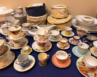 Hand-painted floral teacup and saucer collection