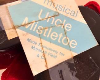 Vintage Marshall Field's Musical Uncle Mistletoe Christmas figurine tag