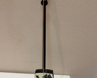 Japanese shamisen string instrument with hand-painted ship motif