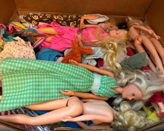 Box of vintage Barbie dolls and accessories