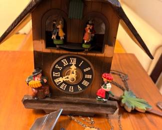 German Black Forest cuckoo clock with dancing figures and weights