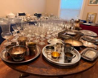 Dining room with crystal stemware and silverplate serving pieces