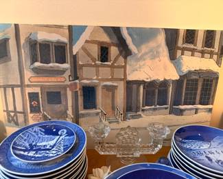 Blue and white Christmas plates with snowy village watercolor