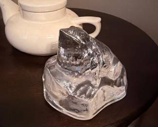 Crystal polar bear sculpture and white teapot