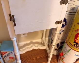 Vintage white painted side table with potato chip and advertising tins