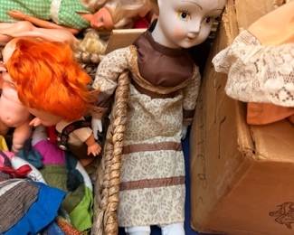 Porcelain doll with long blonde braids