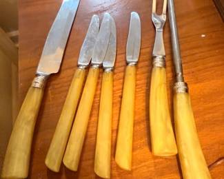 Antique bone-handled cutlery and carving fork