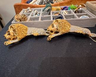 Pair of gold-tone rhinestone lion statement brooches