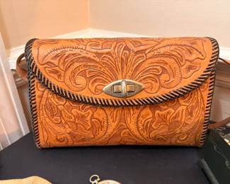 Hand-tooled Western leather handbag with floral design