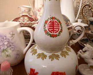 Asian-style decorative pitcher and teapot collection