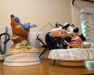 Bird figurines and Disney-style cookie jar