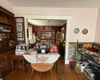 Frames, dining room table, glassware, cabinets, stereo system