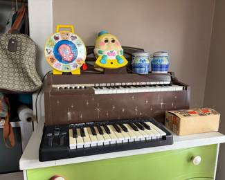 Vintage musical instruments, dressers, toys, pocketbooks, bags