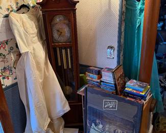 Grandfather clock, antique wedding dress, vintage wedding dress, art, books