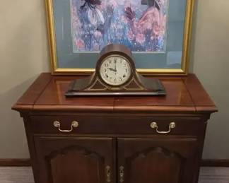 Wood Server Cabinet with FlipOpen Expanding Side Surfaces, Mantel Clock Framed Artwork