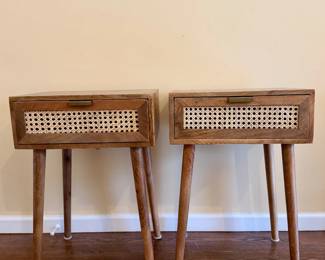 Pair of wood nightstands with cane drawer fronts, clean modern style.