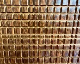 a Brutalist-inspired textured wood buffet/sideboard (originally $10,000)