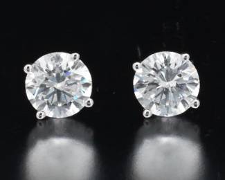 Pair of Gold and 1.53 Ct Total Diamond Ear Studs 