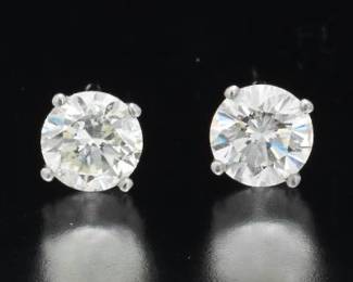 Pair of Gold and 1.12 Ct Total Diamond Ear Studs 