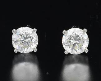 Pair of Gold and 1.18 Ct Total Diamond Ear Studs 