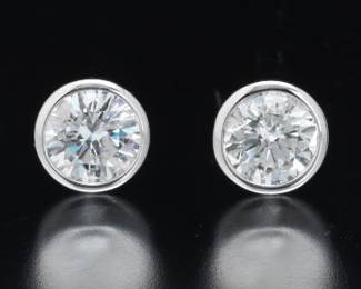 Pair of Gold and 1.22 Ct Total Diamond Ear Studs 