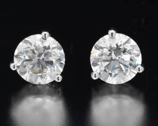 Pair of Gold and 3.13 Ct Total Diamond Ear Studs 