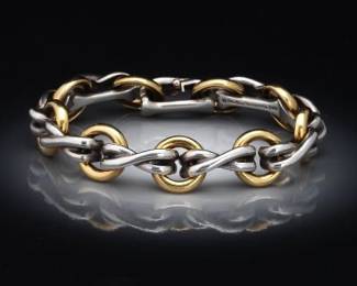 Tiffany  Co. Paloma Picasso 18K Gold and Sterling Silver Hugs and Kisses Bracelet 