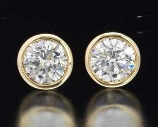 Pair of Gold and 1.06 Ct Total Diamond Ear Studs 