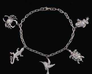 Ladies Vintage Platinum and Diamond Unique Charms Bracelet 