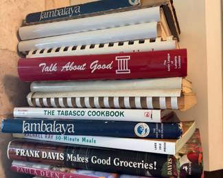 Some of a very large collection of cookbooks  (not shown)