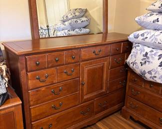 Four piece bedroom dresser with mirror and two side tables also in great condition 