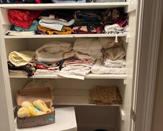 Closet of linens and blankets, some vintage items