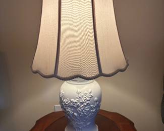 Large vintage white ceramic table lamp with a decorative design of floral motif,  off white shade 