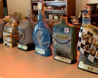 1972 Jim Beam "Mint 400" Desert Rally decanter, vintage 1968 Jim Beam "Reno Centennial" decanter, 1971 Jim Beam "Sahara Champions" decanter, and more.