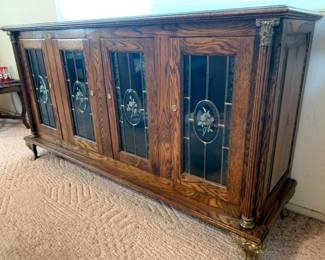Slot Machine Cabinet with brass feet and trim - has 4 locking compartments.