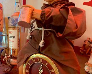 "Merry Monk" Large Figure sitting on Clock