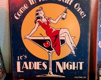 "Ladies Night Everynight" tin sign