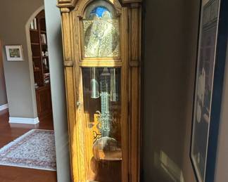 Howard Miller Oak Grandfather Clock with Moon Phase Dial