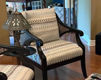 Transitional Armchair with Geometric Pattern Upholstery and Cane Detailing