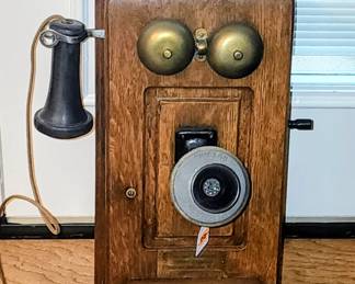 Antique wall mounted phone