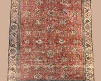 Handwoven wool rug with intricate detailing