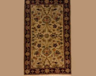 Hand-knotted Persian-style rug with detailed pattern work
