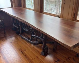 Absolutely one of a kind table, featuring 4 benches. 