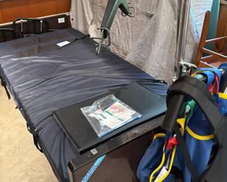Brand new, never used manual hospital bed, with Hoyer lift