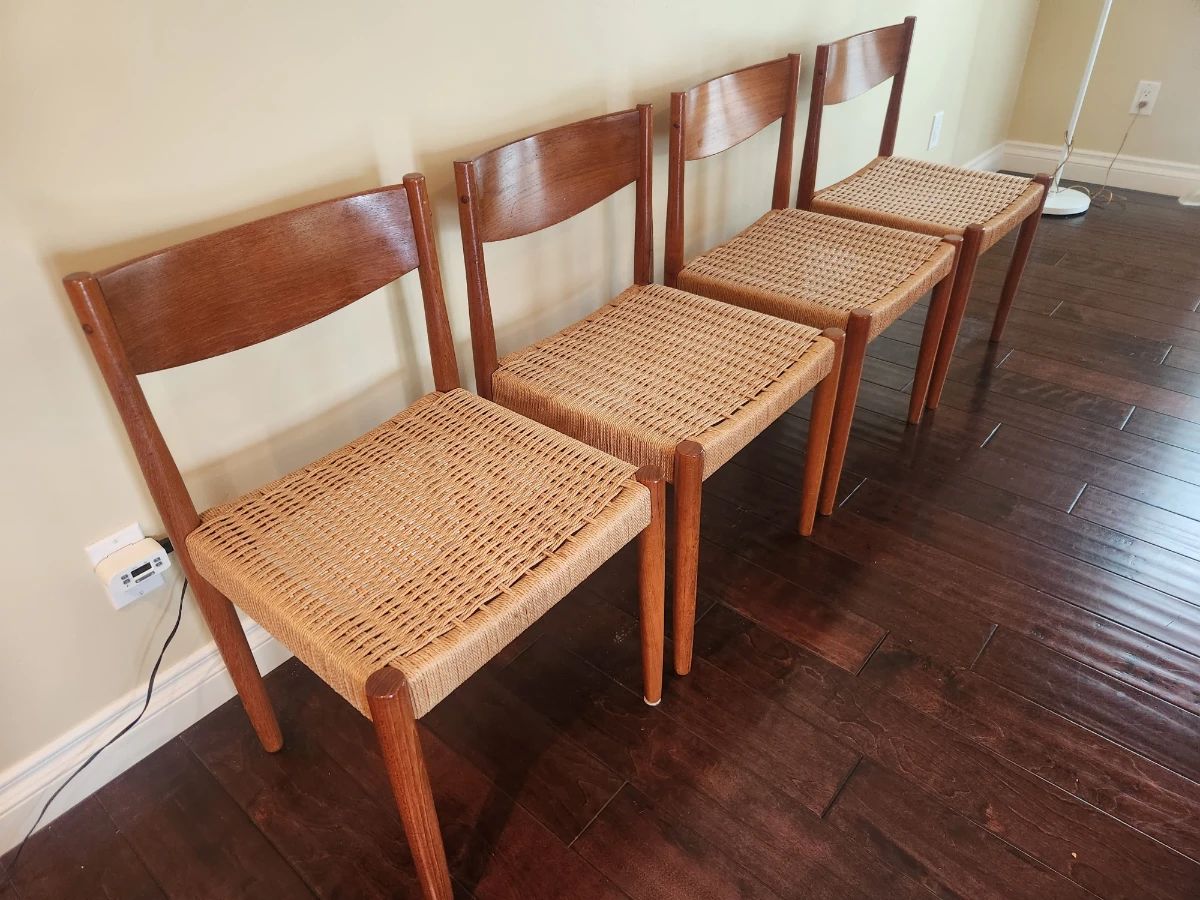SET OF 4 VINTAGE DANISH MODERN DINING CHAIRS ​Material: Solid Teak frames with beautiful wood grain. ​Seats: Original hand-woven Danish paper cord (excellent condition). ​Style: Iconic Mid-Century Modern (MCM) silhouette. ​Condition: Sturdy, clean, and ready for use  SOLD. ​